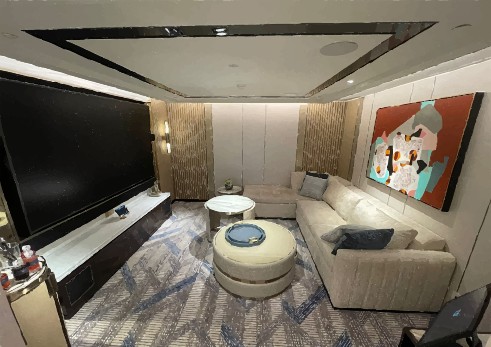 Media room with art panel and in-ceiling KamoGa speakers